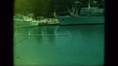 Saint Thomas (1964): The Ship And The Boats Are Standing In The Water