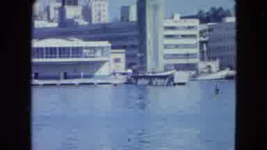 San Juan Puerto Rico.-1964: Waterfront View Of A Small City From A Boat Traveling On