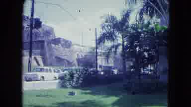 SAN JUAN PUERTO RICO.-1964: Traffic Area With Side Road Garden Car In Red