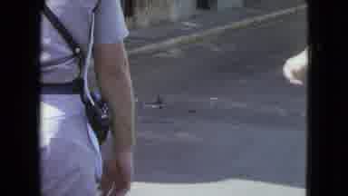 SAN JUAN PUERTO RICO.-1964: Man in Uniform Walking on Street