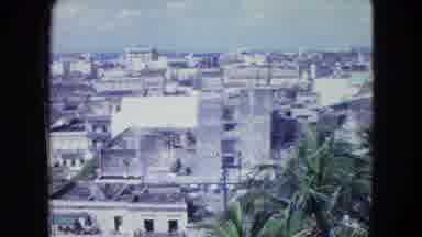 SAN JUAN PUERTO RICO.-1964: Aerial View Of City Buildings And Palm Trees