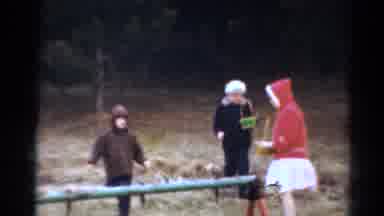 Toledo Ohio (1964): Three Kids Playing Outside Looking For Easter Eggs Hidden In