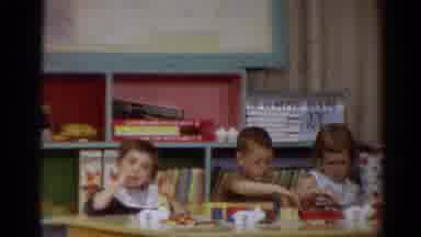 Toledo Ohio (1964): Three Small Children Playing On Table With Toys In Front Of