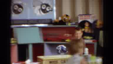 Toledo Ohio (1964): Young Boys And Girls Riding On Hobby Horses Around A Classroom
