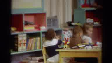 Toledo Ohio (1964): A Teacher In Pearls Instructs Preschoolers In A Colorful