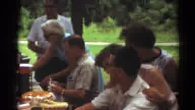Toledo Ohio (1964): Family Picnic In Summertime Group Of People Preparing To Eat