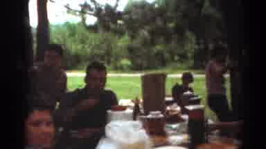 Toledo Ohio (1964): Family Eating Food By A Picnic Table Outside In The Park