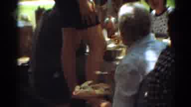 Toledo Ohio (1964): Woman Elderly Eating Countryside With Family Opening Her Mouth