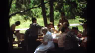 Toledo Ohio (1964): People Gather At A Park At Picnic Tables Eating Food