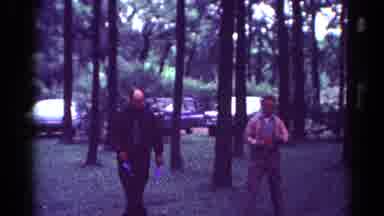 Toledo Ohio (1964): Two Men And A Little Boy Are Playing In The Garden