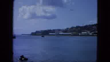 USA Virgin Islands (1964): Big Clouds In A Clear Sky Over A Body Of Water