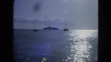 USA Virgin Islands (1964): A View Of 2 Small Boats And A Big Ship In The Ocean