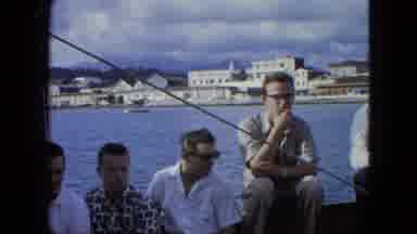 USA Virgin Islands (1964): Group Of Young White Men Sitting On Side Of Boat