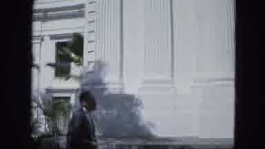 Venezula-1964: Man Walking By The Side Of A Historic Building With Columns