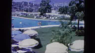 VENEZULA-1964: People Walking Around And Enjoying A Tropical Paradise Resort