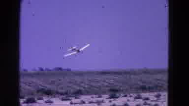 Washington DC (1964): Small Two Seat Plane Flies Low Then Lands On Runway