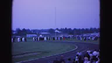 Williamsburg Virginia USA (1964): Many People Walking On A Track On A Cloudy Day