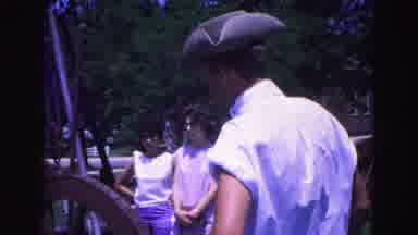 Williamsburg Virginia USA (1964): Man Putting Gunpowder Into A War Cannon And