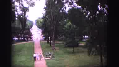 Williamsburg Virginia USA (1964): People Approach On A Path In The Gardens Of A