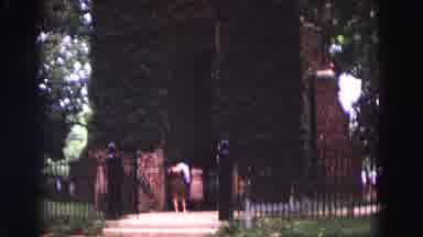 Williamsburg Virginia USA (1964): Person Standing In A House With Fences And A