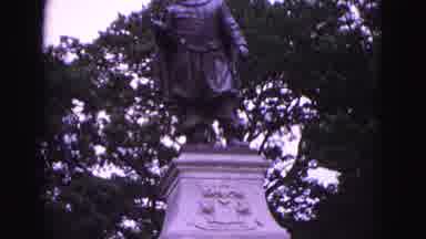 Williamsburg Virginia USA-1964: A Statue Of John Smith In A Park Surrounded By Trees