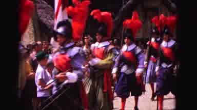 Williamsburg Virginia USA (1964): Men March With Feather Plumes In Their Hats And