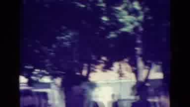 Clarkson Nebraska (1965): Some People Walk In A Park On A Bright Sunny Day