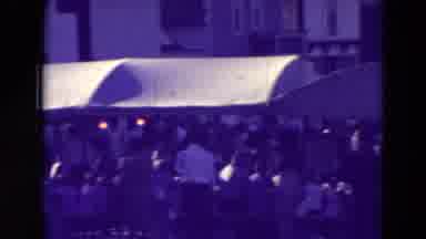 Clarkson Nebraska (1965): A View Of A Closely Packed Street With People In A Choir