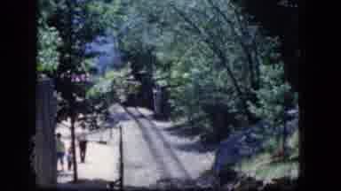 Concord New Hampshire (1965): Family Walking Together In The Forest Near A Train