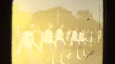 Diller Nebraska (1965): A Marching Band Marches Down A Street In A Parade Followed