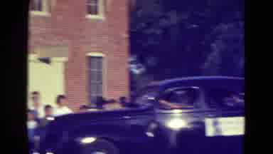 Diller Nebraska (1965): Black Official Vehicle Pulls Up Slowly To Some Kind Of