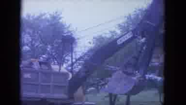 LOUISVILLE KENTUCKY USA-1965: Excavator Loading Debris Into Dump Truck