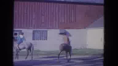 Louisville Kentucky USA (1965): People Riding Horses Bareback Near A Large