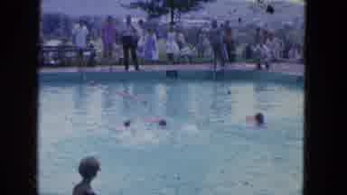 Manchester New Hampshire (1965): Four People Swimming With Boogie Boards In
