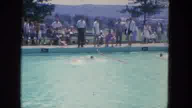 Manchester New Hampshire (1965): People Stand By And Watch The Children Play In