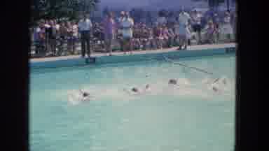 Manchester New Hampshire (1965): Several People Swimming Across A Swimming Pool