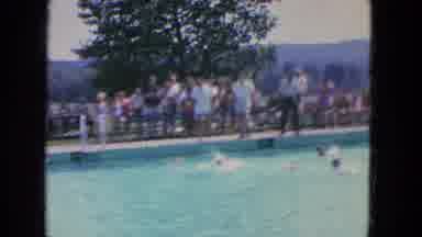 Manchester New Hampshire (1965): Lots Of People Line The Outside Of A Swimming
