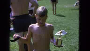 Manchester New Hampshire (1965): A Child Demonstrates A Trophy And A Medal For