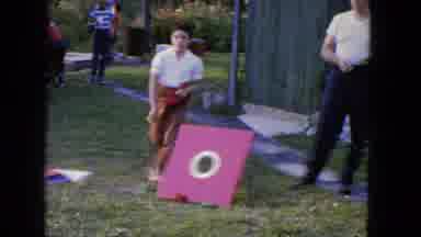 Manchester New Hampshire (1965): Family Plays A Game Outside Where They Try To Get