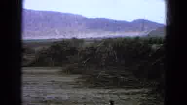 Pueblo Mexico (1965): A Large Farm Vehicle In A Field Switching To A View Of Just