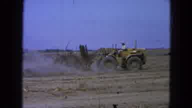 Pueblo Mexico (1965): A Guy Driving A Machine To Lay The Dirt Flat