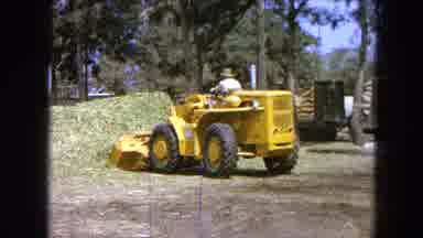 Pueblo Mexico (1965): Machinery Moving Hay
