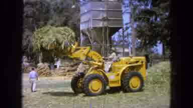 Pueblo Mexico (1965): Man Moving Hay With Machinery
