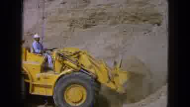 Pueblo Mexico (1965): Worker Drive A Loader To Move Sand