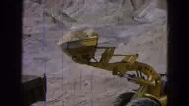 Pueblo Mexico (1965): A Construction Front End Loader Is Loading Dirt Into A Dump