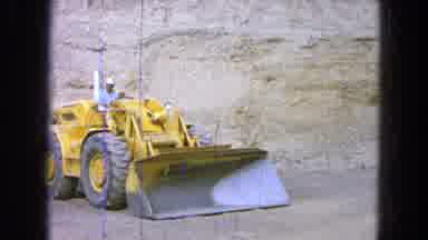 Pueblo Mexico (1965): A Man Inside A Tractor Beginning To Operate The Machine
