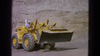 Pueblo Mexico (1965): Man Operating Tractor With Bucket Loader Goes To Work On The