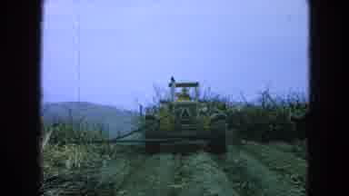 Pueblo Mexico (1965): Someone Using Farm Machinery To Clear Land For Planting