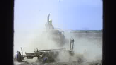 Pueblo Mexico (1965): A Tractor Is Used To Plough The Field Which Is Full Of Dust