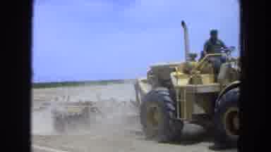 Pueblo Mexico (1965): A Young Man Efficiently Pulling A Tractor Through The Dirt